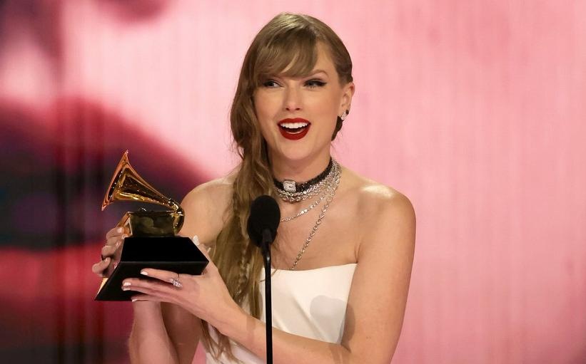 Taylor Swift says she only revealed her new record at the Grammys because she took home the trophy.