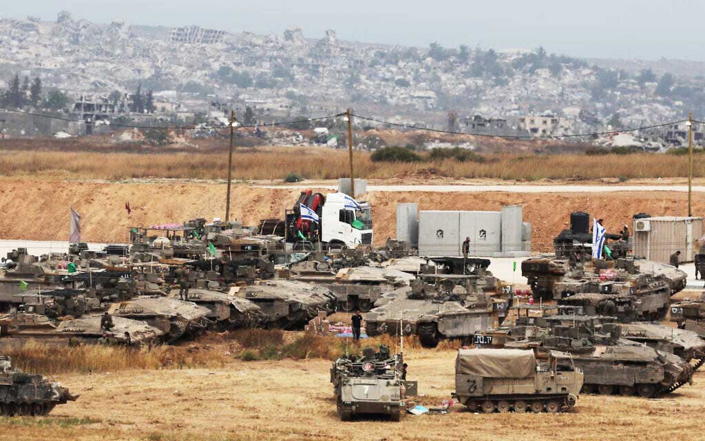 Israel Begins Withdrawing Troops from Gaza, Palestinians Return Home